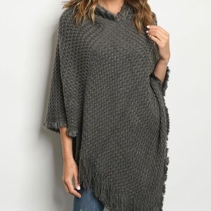 Poncho with faux fur hood